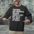 Teachers Are Underpaid Because America Does Not Value Men Women Unisex Sweatshirt, gift for family, gift for coworker Teachers Are Underpaid Because America Does Not Value Men Women Unisex Sweatshirt, gift for family, gift for coworker