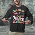 Teaching Future Leaders Groovy Teacher Back To School Unisex Sweatshirt, Future Teacher Sweatshirts, Groovy Teacher Sweatshirts, gift for family, gift for coworker