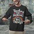 Teaching Tiny Humans Big Things I Teacher Unisex Sweatshirt, gift for family, gift for coworker Teaching Tiny Humans Big Things I Teacher Unisex Sweatshirt, gift for family, gift for coworker