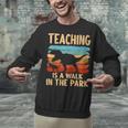Teaching Is a Walk In Park Dinosaur Teacher Unisex Sweatshirt, gift for family, gift for coworker