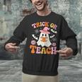 Trick Or Teach Cute Floral Ghost Teacher Halloween Costume Unisex Sweatshirt, gift for family, gift for coworker