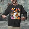 Trick Or Teach Cute Ghost Coffee Pumpkins Halloween Teacher Unisex Sweatshirt, gift for family, gift for coworker Trick Or Teach Cute Ghost Coffee Pumpkins Halloween Teacher Unisex Sweatshirt, gift for family, gift for coworker