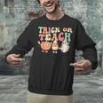 Trick Or Teach Pumpkin Candy Corn Ghost Halloween Teacher Unisex Sweatshirt, gift for family, gift for coworker
