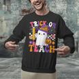Trick Or Teach Teacher Pencil Ghost Halloween Teacher Unisex Sweatshirt, gift for family, gift for coworker Trick Or Teach Teacher Pencil Ghost Halloween Teacher Unisex Sweatshirt, gift for family, gift for coworker