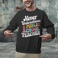 Never Underestimate a Public School Teacher Public Education Unisex Sweatshirt, gift for family, gift for coworker Never Underestimate a Public School Teacher Public Education Unisex Sweatshirt, gift for family, gift for coworker