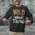 Wild About Teaching Teacher Student First Day Of School Unisex Sweatshirt, gift for family, gift for coworker