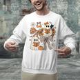 Ghost Reading Books Halloween Bow Spooky Teacher Student Unisex Sweatshirt, gift for family, gift for coworker Ghost Reading Books Halloween Bow Spooky Teacher Student Unisex Sweatshirt, gift for family, gift for coworker