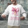 I'm Literally Just a Teacher Pencil Coquette Bow School Unisex Sweatshirt, gift for family, gift for coworker I'm Literally Just a Teacher Pencil Coquette Bow School Unisex Sweatshirt, gift for family, gift for coworker