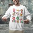 Team TK Teacher Christmas Groovy Smile Face Girl Boy Kid TK Unisex Sweatshirt, Groovy Teacher Sweatshirts, gift for family, gift for coworker Team TK Teacher Christmas Groovy Smile Face Girl Boy Kid TK Unisex Sweatshirt, Groovy Teacher Sweatshirts, gift for family, gift for coworker