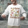 We All Thrive Under Different Conditions SPED Teacher Unisex Sweatshirt, gift for family, gift for coworker We All Thrive Under Different Conditions SPED Teacher Unisex Sweatshirt, gift for family, gift for coworker
