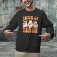 Groovy Teacher Halloween Trick Or Teach Ghost Men Women Kids Men Graphic Sweatshirt, Groovy Teacher Sweatshirts, gift for family, gift for coworker Groovy Teacher Halloween Trick Or Teach Ghost Men Women Kids Men Graphic Sweatshirt, Groovy Teacher Sweatshirts, gift for family, gift for coworker