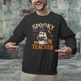 Spooky Teacher Halloween Cute Ghost Pumpkin Reading Women Men Graphic Sweatshirt, gift for family, gift for coworker