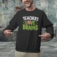 Teachers Love Brains Halloween Teacher Zombie Men Graphic Sweatshirt, gift for family, gift for coworker Teachers Love Brains Halloween Teacher Zombie Men Graphic Sweatshirt, gift for family, gift for coworker