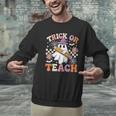 Trick Or Teach Groovy Teacher Halloween Retro Ghost Men Graphic Sweatshirt, Groovy Teacher Sweatshirts, gift for family, gift for coworker Trick Or Teach Groovy Teacher Halloween Retro Ghost Men Graphic Sweatshirt, Groovy Teacher Sweatshirts, gift for family, gift for coworker
