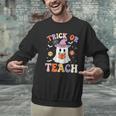 Trick Or Teach Teacher Groovy Ghost Halloween Teacher Men Graphic Sweatshirt, Groovy Teacher Sweatshirts, gift for family, gift for coworker