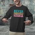 Never Underestimate A Public School Teacher Groovy Women Men Graphic Sweatshirt, Groovy Teacher Sweatshirts, gift for family, gift for coworker Never Underestimate A Public School Teacher Groovy Women Men Graphic Sweatshirt, Groovy Teacher Sweatshirts, gift for family, gift for coworker