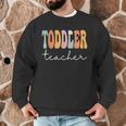 Toddler Teacher Retro Groovy Women Happy First Day Of School Men Graphic Sweatshirt, novelty gifts, funny gifts