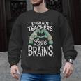 1st Grade Teachers Love Brains Shirt Halloween Teacher Men Graphic Sweatshirt, trending gift 1st Grade Teachers Love Brains Shirt Halloween Teacher Men Graphic Sweatshirt, trending gift