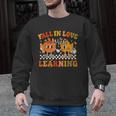 Fall In Love With Learning Autumn Pumpkin Fall Teacher Kids Men Graphic Sweatshirt, trending gift Fall In Love With Learning Autumn Pumpkin Fall Teacher Kids Men Graphic Sweatshirt, trending gift