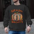 Fall In Love With Learning Book Lover Autumn Pumpkin Teacher Men Graphic Sweatshirt, trending gift Fall In Love With Learning Book Lover Autumn Pumpkin Teacher Men Graphic Sweatshirt, trending gift