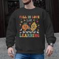 Groovy Fall In Love With Learning Autumn Pumpkin Teacher Men Graphic Sweatshirt, Groovy Teacher Gifts, trending gift Groovy Fall In Love With Learning Autumn Pumpkin Teacher Men Graphic Sweatshirt, Groovy Teacher Gifts, trending gift
