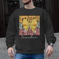 Interventionist Teacher Groovy Coquette Bow Back To School Men Graphic Sweatshirt, Groovy Teacher Gifts, trending gift