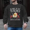 Be Nice To The Teacher Santa Is Watching School Christmas Men Graphic Sweatshirt, trending gift Be Nice To The Teacher Santa Is Watching School Christmas Men Graphic Sweatshirt, trending gift