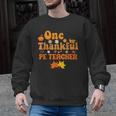 One Thankful PE Teacher Thanksgiving Fall Autumn Groovy Men Graphic Sweatshirt, Pe Teacher Gifts, Groovy Teacher Gifts, trending gift One Thankful PE Teacher Thanksgiving Fall Autumn Groovy Men Graphic Sweatshirt, Pe Teacher Gifts, Groovy Teacher Gifts, trending gift