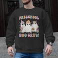 Preschool Boo Crew Groovy Halloween Floral Ghost Teacher Men Women Kids Men Graphic Sweatshirt, Groovy Teacher Gifts, trending gift Preschool Boo Crew Groovy Halloween Floral Ghost Teacher Men Women Kids Men Graphic Sweatshirt, Groovy Teacher Gifts, trending gift