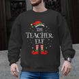 The Teacher Elf Christmas Family Matching Group Xmas Men Graphic Sweatshirt, trending gift The Teacher Elf Christmas Family Matching Group Xmas Men Graphic Sweatshirt, trending gift