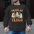 Teacher Halloween Trick Or Teach Retro Groovy Floral Ghost Men Graphic Sweatshirt, Groovy Teacher Gifts, trending gift Teacher Halloween Trick Or Teach Retro Groovy Floral Ghost Men Graphic Sweatshirt, Groovy Teacher Gifts, trending gift