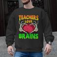 Teacher Teachers Love Brains Skeleton Hand Heart Halloween Men Graphic Sweatshirt, trending gift Teacher Teachers Love Brains Skeleton Hand Heart Halloween Men Graphic Sweatshirt, trending gift