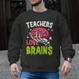 Teachers Love Brains Skeleton Halloween Teacher Funny Men Graphic Sweatshirt, trending gift Teachers Love Brains Skeleton Halloween Teacher Funny Men Graphic Sweatshirt, trending gift