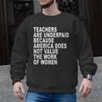 Teachers Are Underpaid Because America Does Not Value Men Women Men Graphic Sweatshirt, trending gift Teachers Are Underpaid Because America Does Not Value Men Women Men Graphic Sweatshirt, trending gift