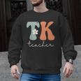 TK Teacher Retro Groovy Vintage Happy First Day Of School Men Graphic Sweatshirt, Groovy Teacher Gifts, trending gift TK Teacher Retro Groovy Vintage Happy First Day Of School Men Graphic Sweatshirt, Groovy Teacher Gifts, trending gift