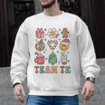 Team TK Teacher Christmas Groovy Smile Face Girl Boy Kid TK Men Graphic Sweatshirt, Groovy Teacher Gifts, trending gift Team TK Teacher Christmas Groovy Smile Face Girl Boy Kid TK Men Graphic Sweatshirt, Groovy Teacher Gifts, trending gift