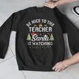 Christmas Be Nice To The Teacher Santa Is Watching Xmas Men Graphic Sweatshirt, funny design Christmas Be Nice To The Teacher Santa Is Watching Xmas Men Graphic Sweatshirt, funny design