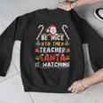 Be Nice To The Teacher Santa Is Watching Christmas Men Graphic Sweatshirt, funny design Be Nice To The Teacher Santa Is Watching Christmas Men Graphic Sweatshirt, funny design