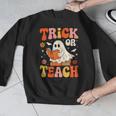 Trick Or Teach Halloween Shirt For Teacher Kids Floral Ghost Men Graphic Sweatshirt, funny design Trick Or Teach Halloween Shirt For Teacher Kids Floral Ghost Men Graphic Sweatshirt, funny design