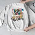 Retro Teaching Future Leaders Groovy Teacher Back To School Men Graphic Sweatshirt, Future Teacher Gifts, Groovy Teacher Gifts, funny design