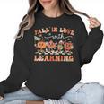 Fall In Love With Learning Autumn Teacher Thanksgiving Women Crewneck Sweatshirt, trending gift