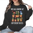 We All Grow At Different Rates Back To School Teacher Women Crewneck Sweatshirt, trending gift