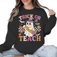 Retro Floral Ghost Trick Or Teach Groovy Teacher Halloween Women Crewneck Sweatshirt, Groovy Teacher Gifts, trending gift Retro Floral Ghost Trick Or Teach Groovy Teacher Halloween Women Crewneck Sweatshirt, Groovy Teacher Gifts, trending gift