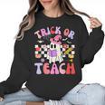 Trick Or Teach Halloween Teacher Floral Ghost Groovy Women Crewneck Sweatshirt, Groovy Teacher Gifts, trending gift Trick Or Teach Halloween Teacher Floral Ghost Groovy Women Crewneck Sweatshirt, Groovy Teacher Gifts, trending gift