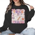 Trick Or Teach Retro Halloween Teacher Look Women Crewneck Sweatshirt, trending gift Trick Or Teach Retro Halloween Teacher Look Women Crewneck Sweatshirt, trending gift