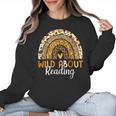 Wild About Reading Teacher Back To School Leopard Rainbow Women Crewneck Sweatshirt, trending gift Wild About Reading Teacher Back To School Leopard Rainbow Women Crewneck Sweatshirt, trending gift