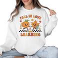 Fall In Love With Learning Teacher Student Autumn Pumpkin Women Crewneck Sweatshirt, trending gift Fall In Love With Learning Teacher Student Autumn Pumpkin Women Crewneck Sweatshirt, trending gift