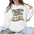 Retro Teaching Future Leaders Groovy Teacher Back To School Women Crewneck Sweatshirt, Future Teacher Gifts, Groovy Teacher Gifts, trending gift