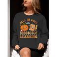 Fall In Love With Reading Book Autumn Pumpkins And Teachers Women Crewneck Sweatshirt, funny gift Fall In Love With Reading Book Autumn Pumpkins And Teachers Women Crewneck Sweatshirt, funny gift