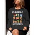 We All Grow At Different Rates Back To School Teacher Women Crewneck Sweatshirt, funny gift
